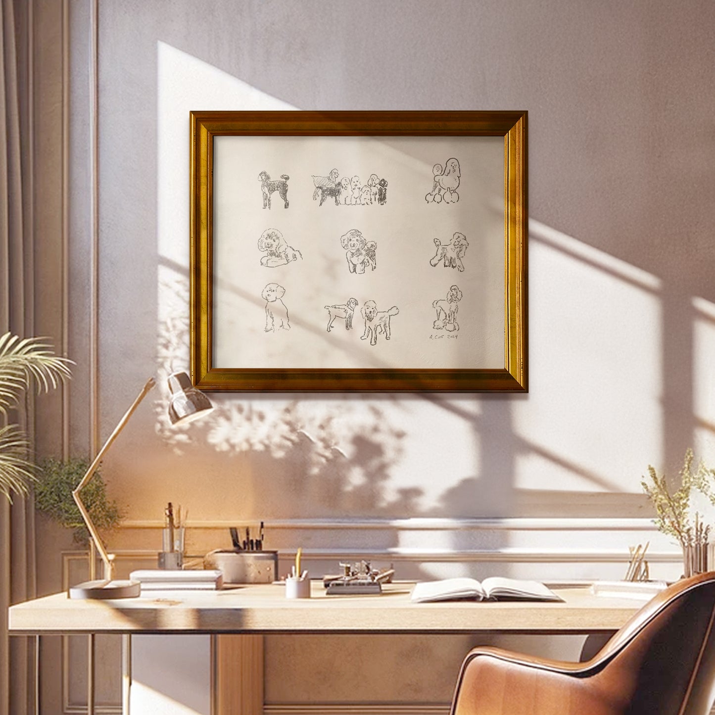 Framed artwork of dog sketches on a wall above a desk with a lamp and chair.