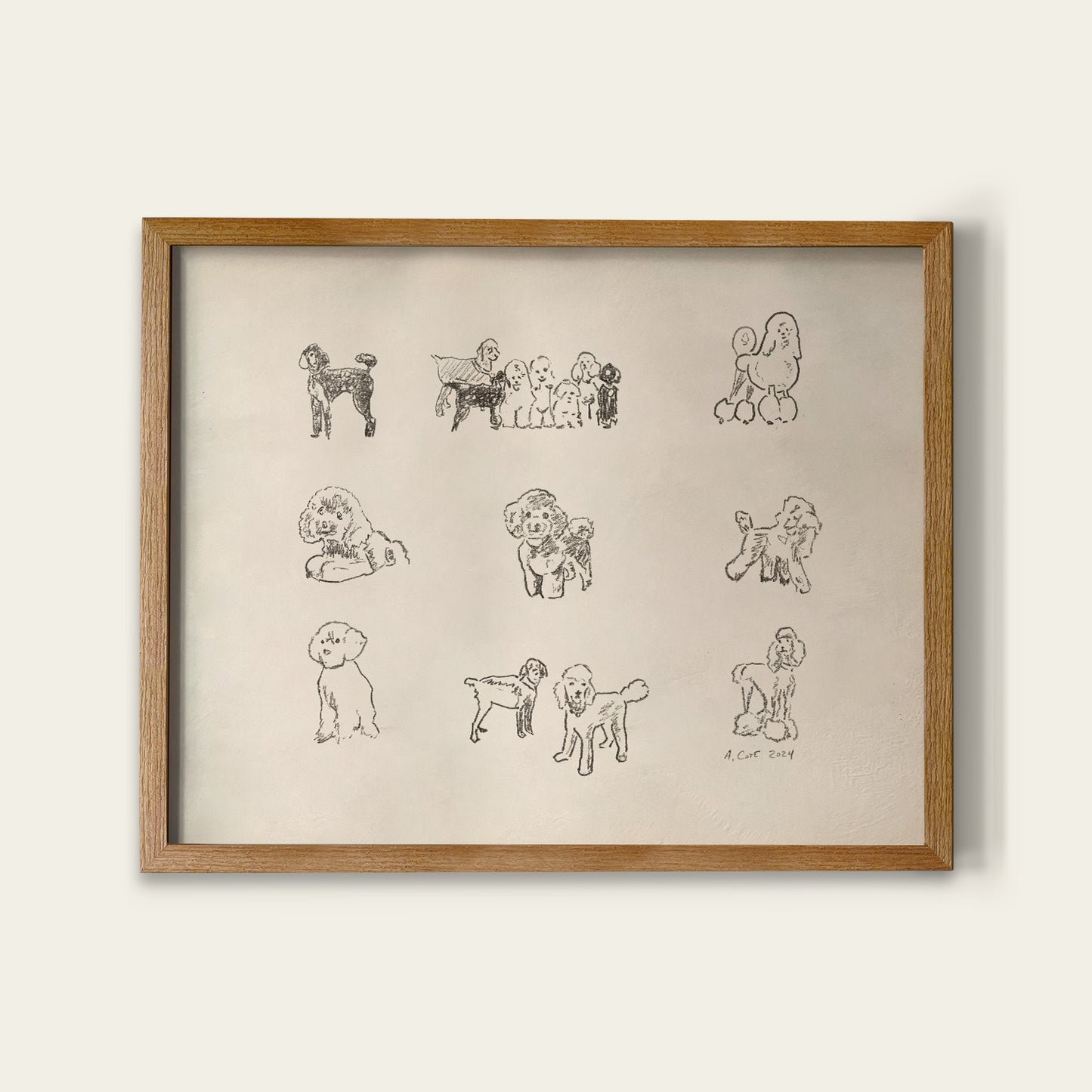 Framed artwork with line drawings of dogs on a beige background
