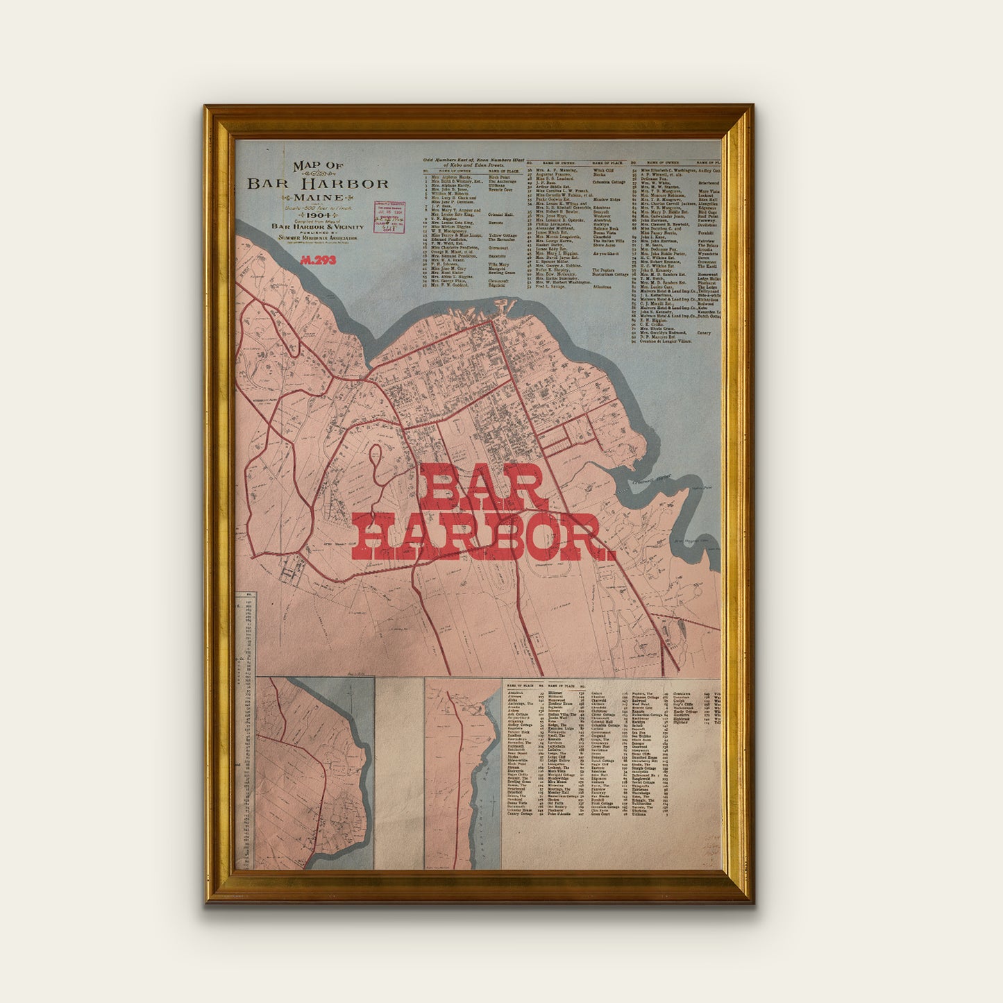 Framed map of Bar Harbor with a gold frame on a white wall