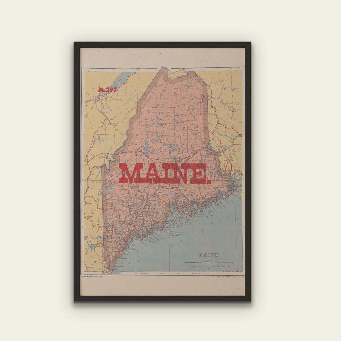 Framed map of Maine with a red 'MAINE' text on a light background