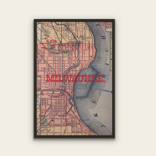 Framed vintage-style map of Milwaukee on a white wall
