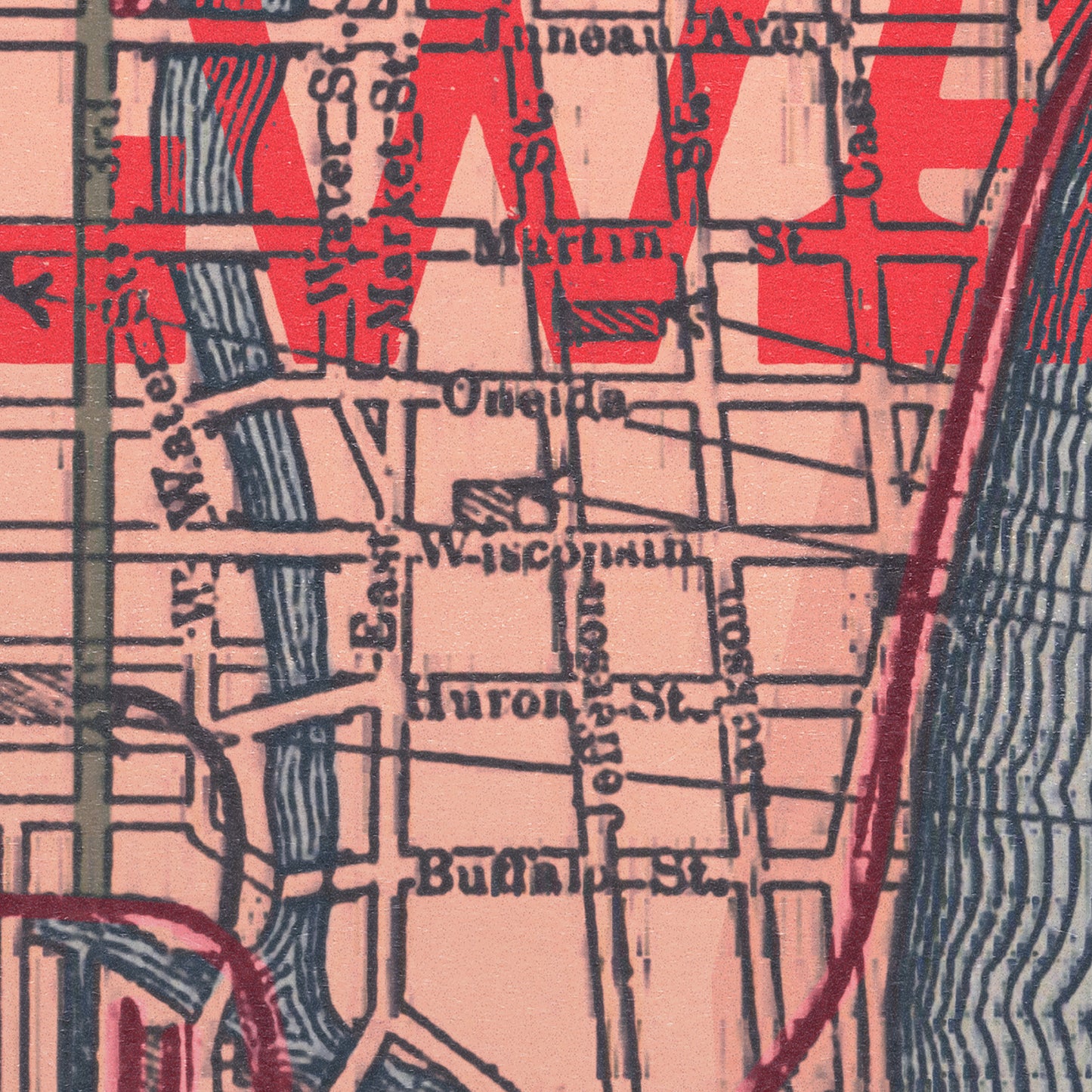Close-up of a vintage-style street map with red and black text on a beige background.