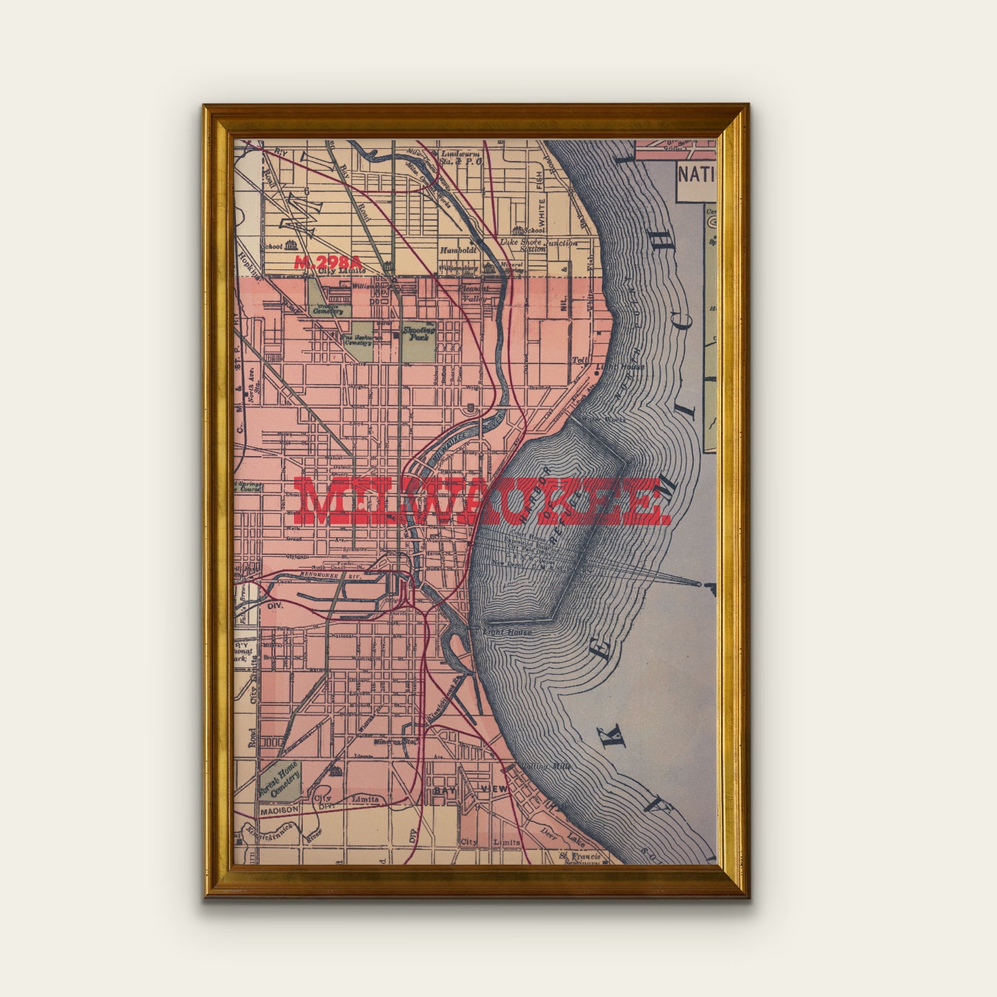 Framed vintage map of Milwaukee on a white wall