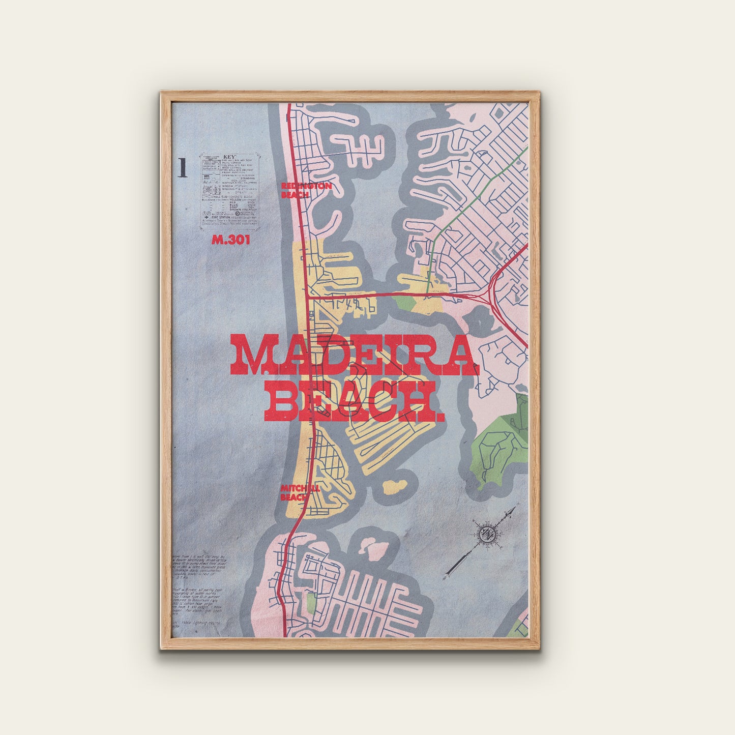 Framed map poster of Madeira Beach with a wooden frame on a white wall.