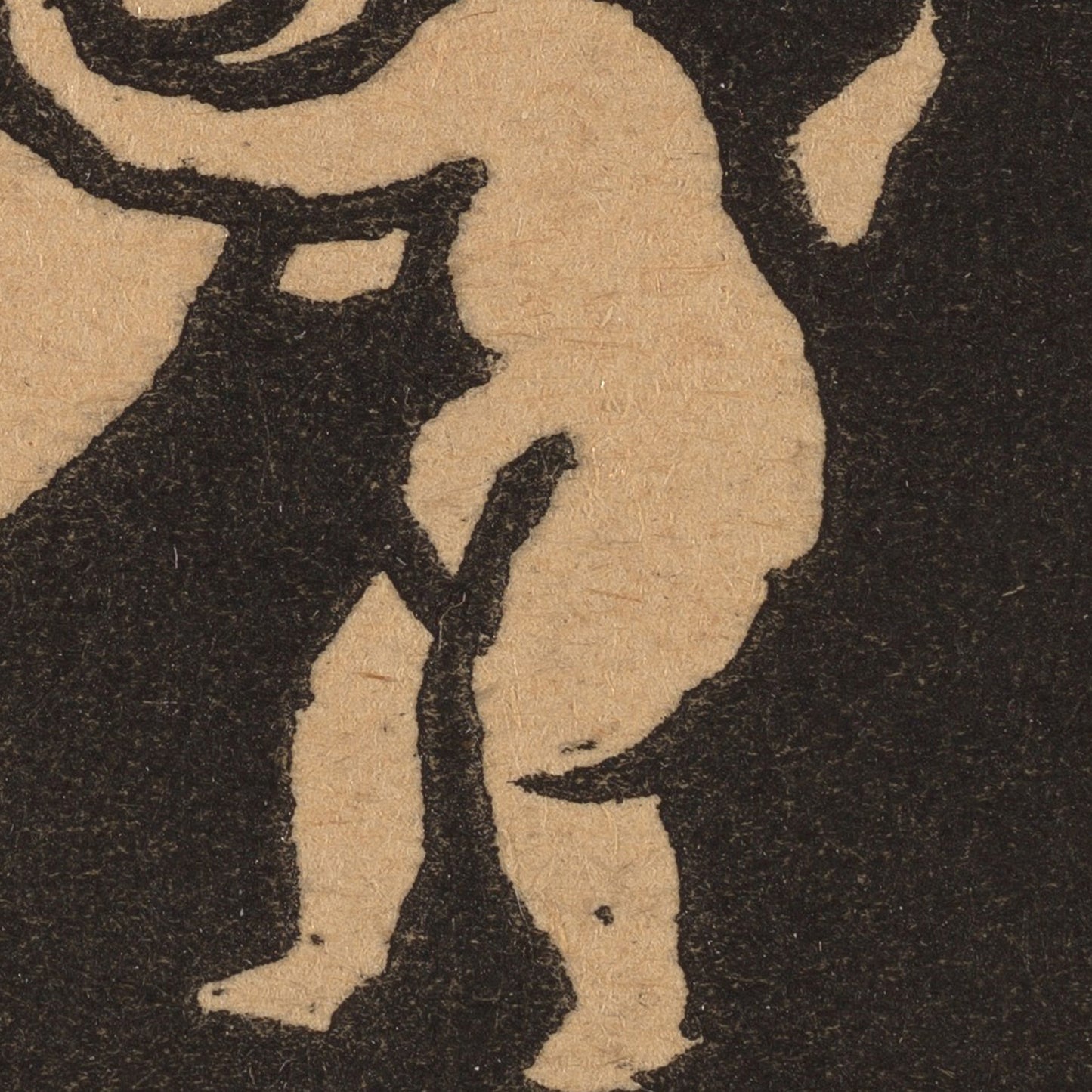 Black silhouette of a baby on a textured beige background