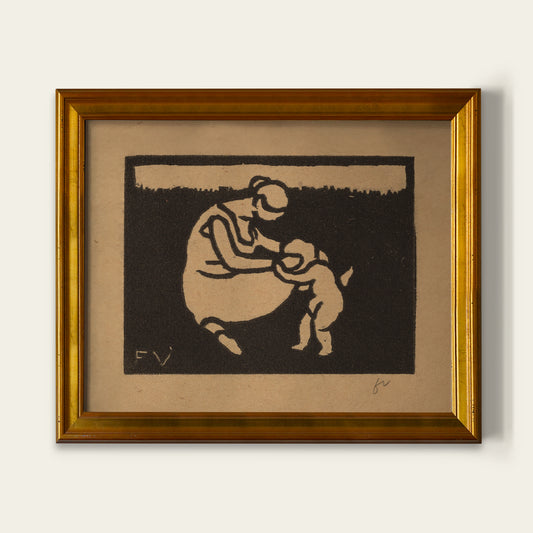 Framed artwork of a woman and child on a plain background