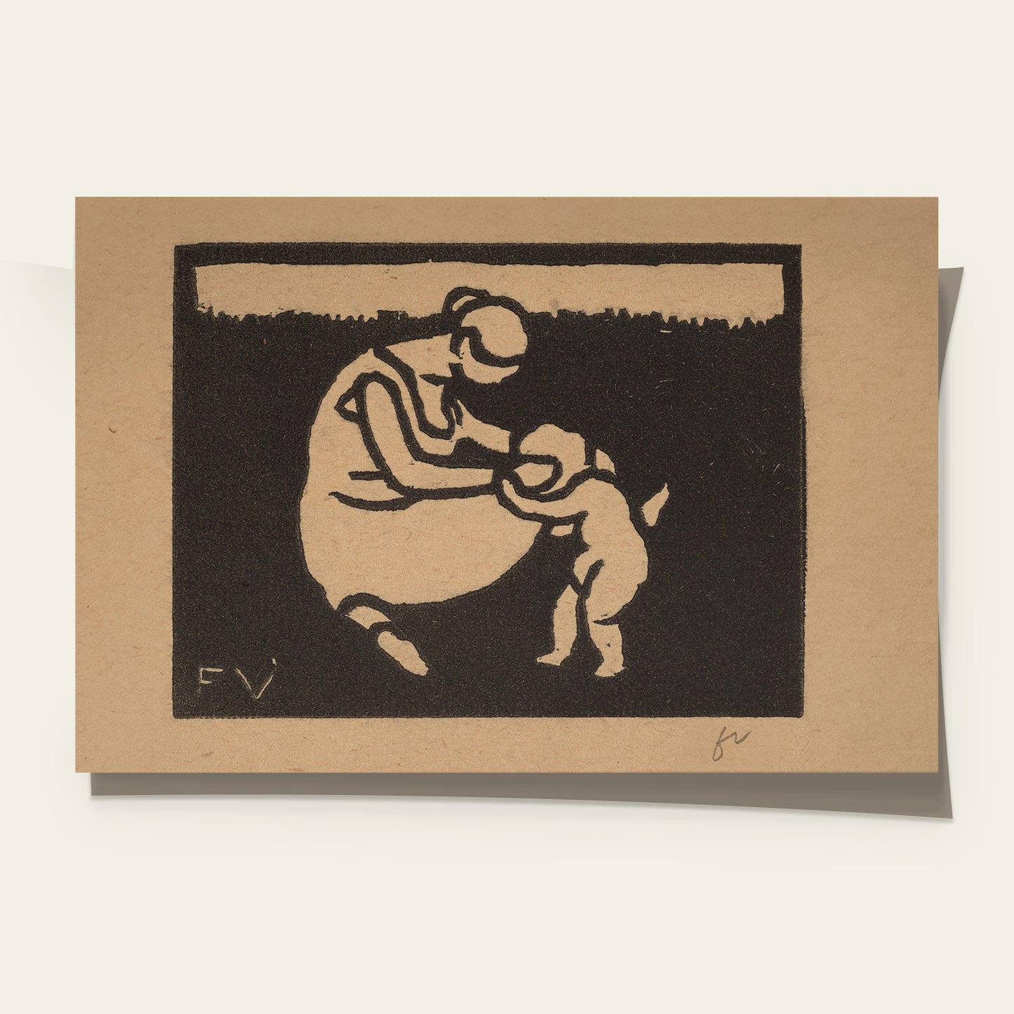 Woodcut print of a mother and child on a brown card